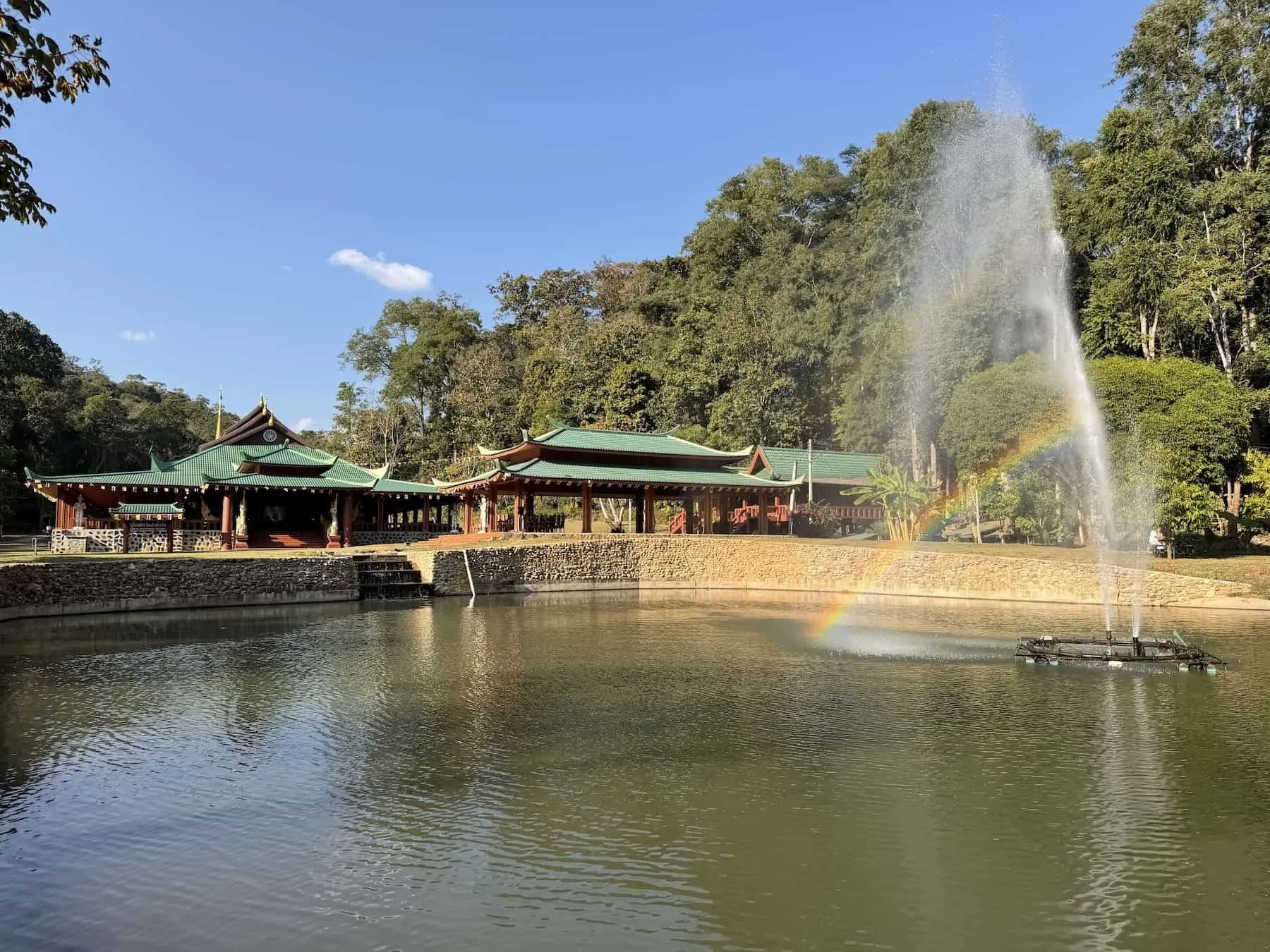 Dhamma Hall with fountain at Wat Pa Tam Wua